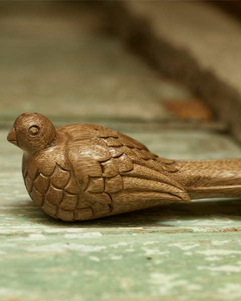 carved-wooden-bird-door-wedge