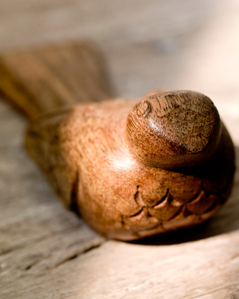 carved-wooden-bird-door-wedge